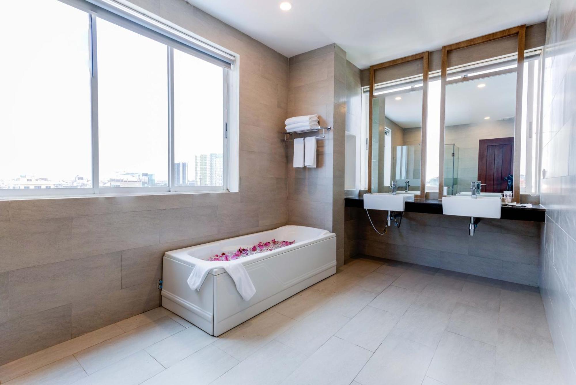 Joli Hotel Phnom Penh Zimmer foto
