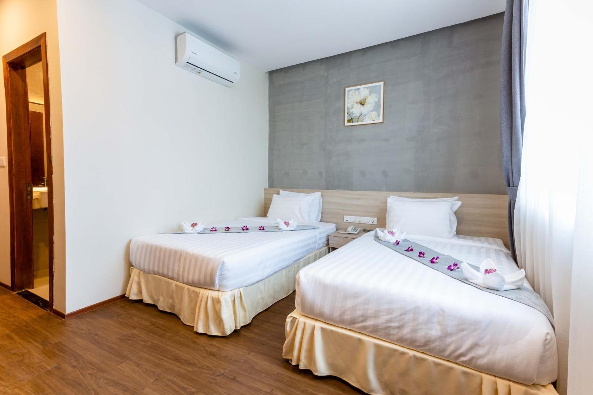 Joli Hotel Phnom Penh Zimmer foto