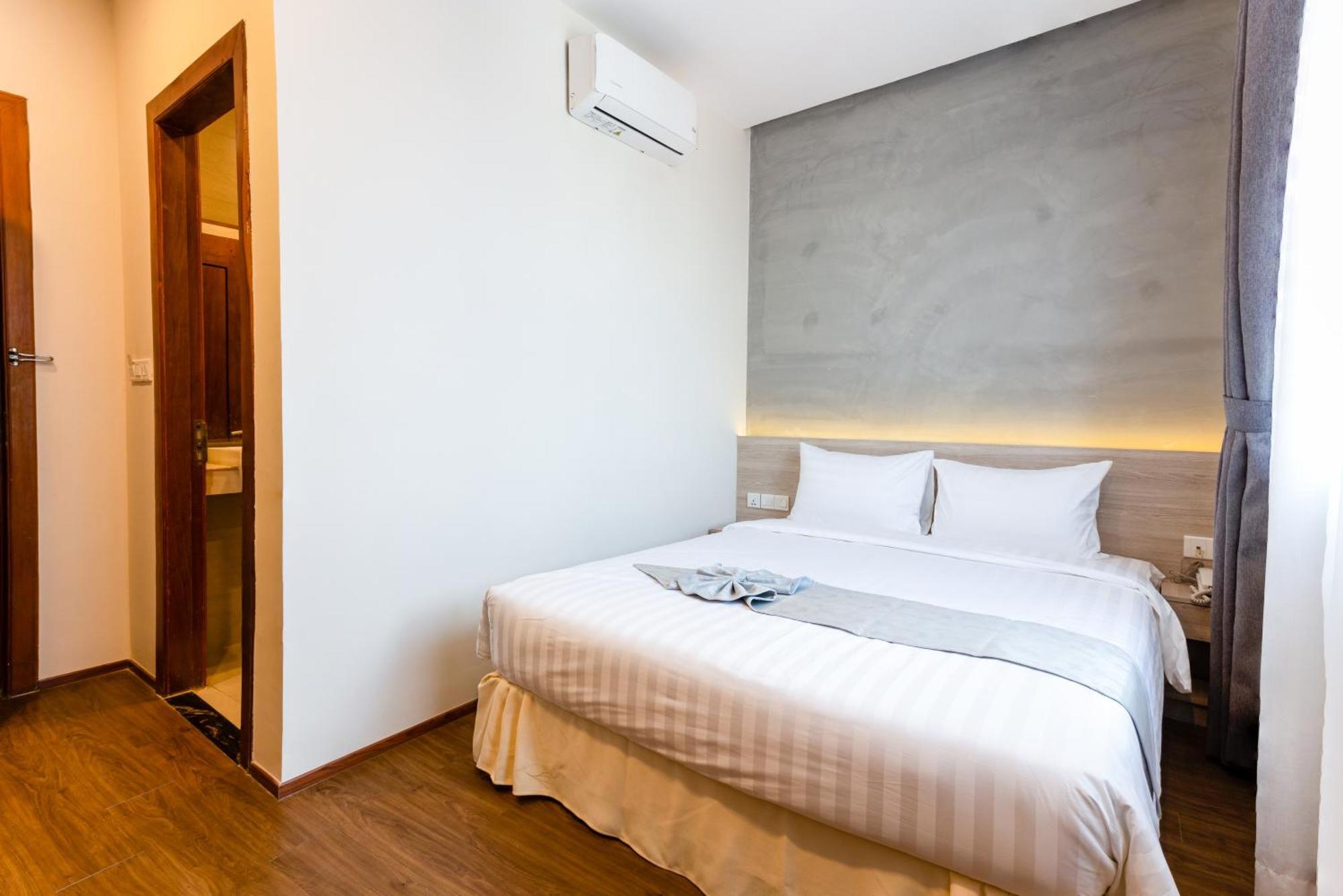 Joli Hotel Phnom Penh Zimmer foto
