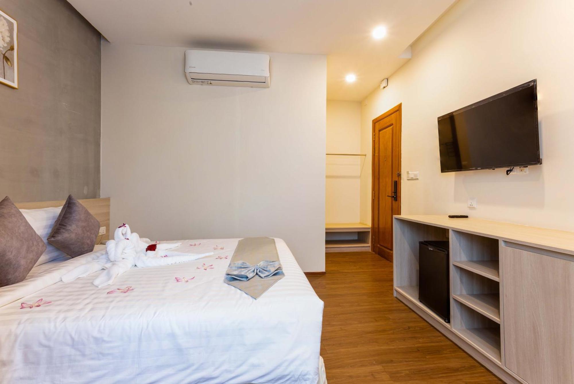 Joli Hotel Phnom Penh Zimmer foto