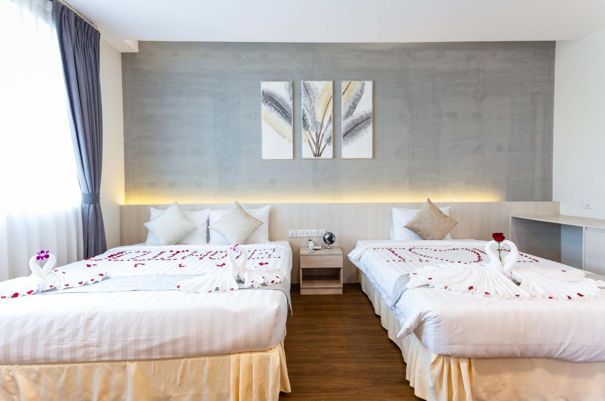 Joli Hotel Phnom Penh Zimmer foto