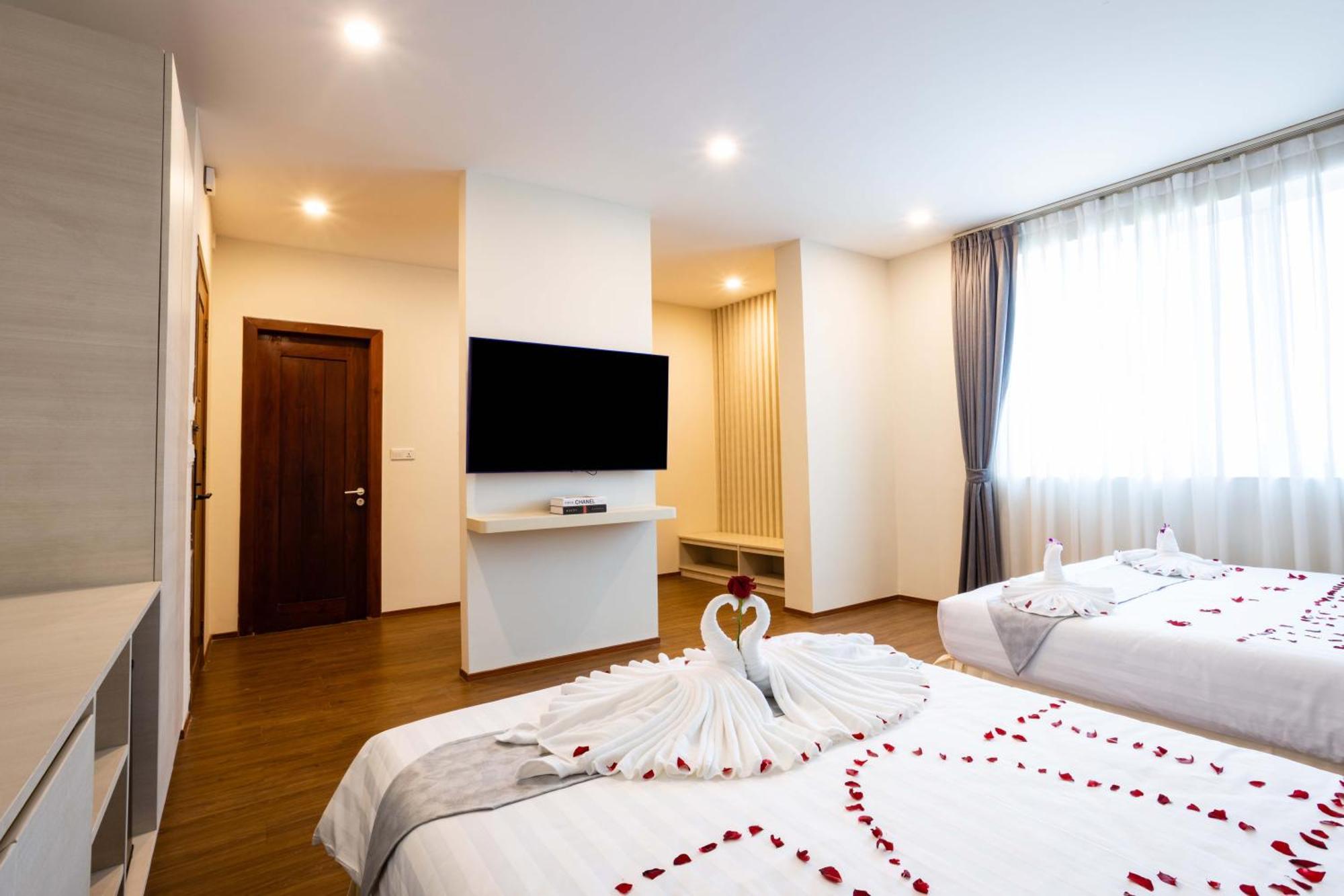 Joli Hotel Phnom Penh Zimmer foto